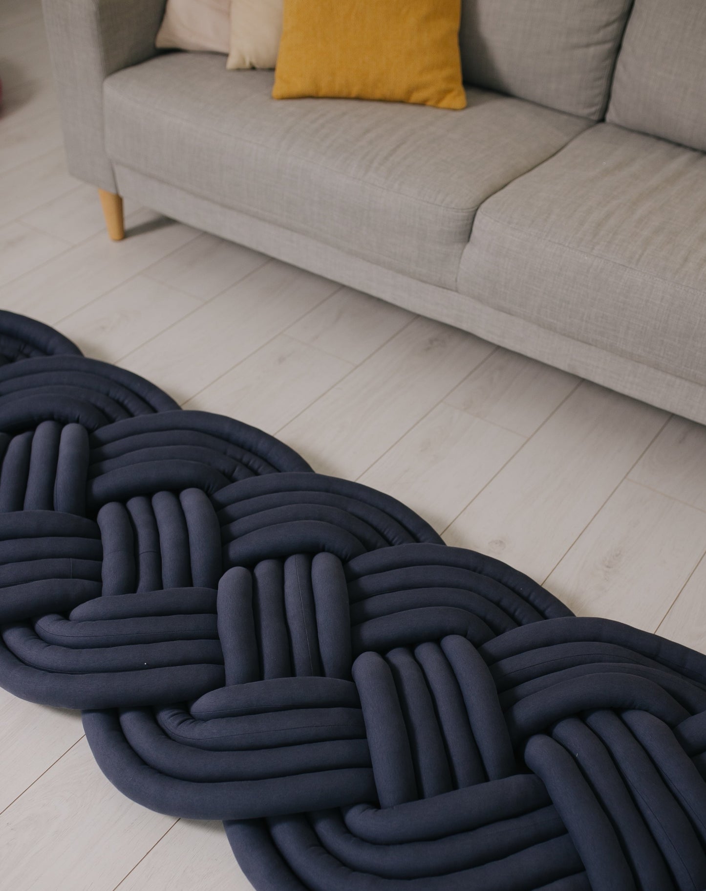 Swirl braided rug