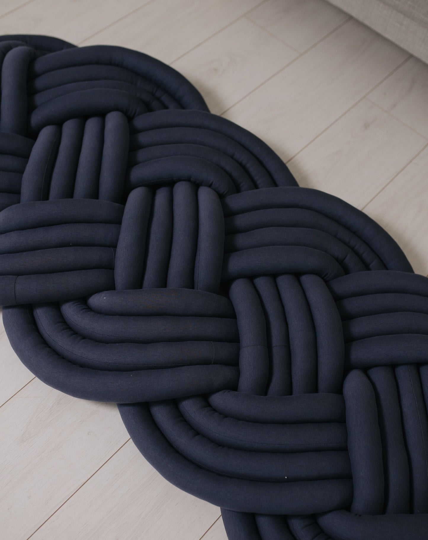 Swirl braided rug